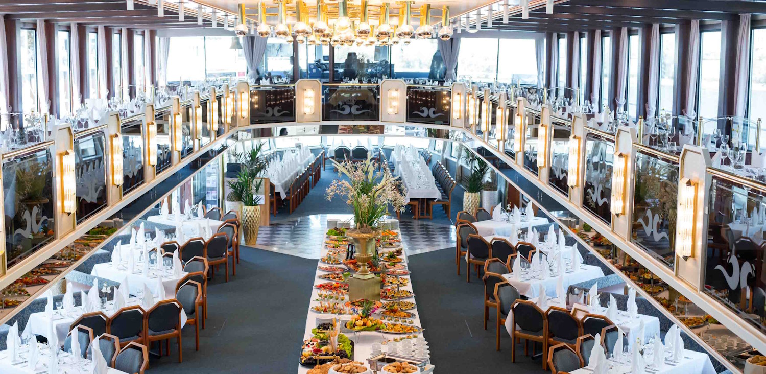 A photo of the dining hall inside a ship
